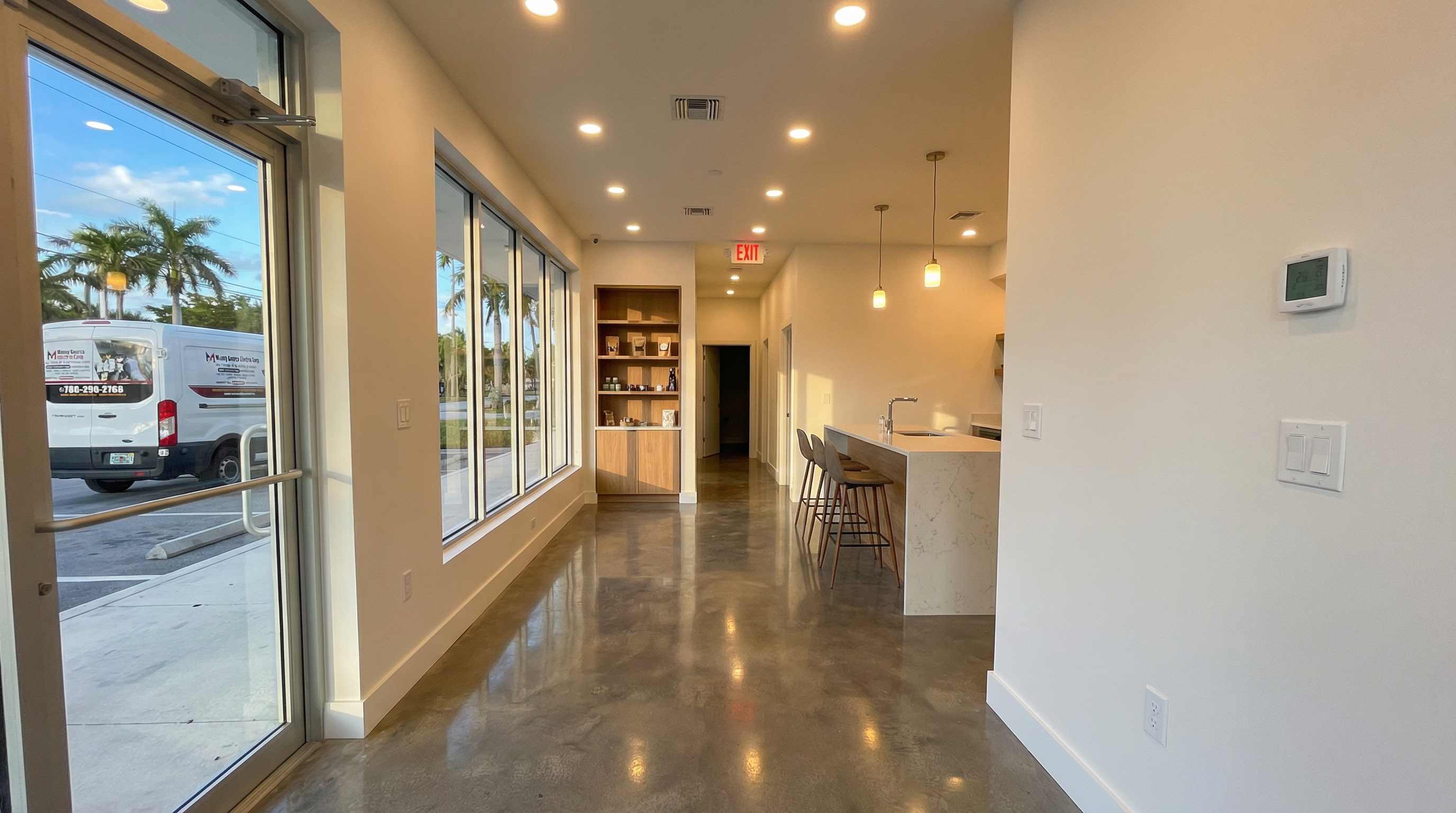 Commercial retail space electrical work with modern lighting